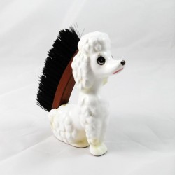 Poodle clothes brush